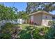 Charming backyard with lush greenery and a meticulously manicured garden at 1119 Highland S St, St Petersburg, FL 33701