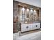 Custom bar area with a wine rack, stylish cabinetry, and modern lighting at 1119 Highland S St, St Petersburg, FL 33701