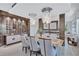 Formal dining room with decorative wine display and view of living room at 1119 Highland S St, St Petersburg, FL 33701