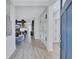 Welcoming foyer with a glimpse of the living room, decorative niches, and tile flooring at 1119 Highland S St, St Petersburg, FL 33701