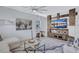 Bright living room features modern decor, stylish furniture, and a custom entertainment center at 1119 Highland S St, St Petersburg, FL 33701
