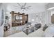 Cozy living room with a fireplace feature in the entertainment center and stylish recessed display niches at 1119 Highland S St, St Petersburg, FL 33701