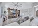 Spacious living room boasts custom built-ins, modern lighting, and stylish furnishings at 1119 Highland S St, St Petersburg, FL 33701