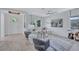 Cozy living room with neutral tones, a stylish area rug, and ample natural light at 1119 Highland S St, St Petersburg, FL 33701
