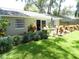 Landscaped backyard featuring a patio area perfect for outdoor entertaining and relaxing at 1212 Rosewood St, Largo, FL 33770