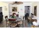 Eat-in kitchen features a dining table with seating and updated ceiling fan at 1212 Rosewood St, Largo, FL 33770