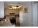 Bright kitchen with white cabinets, stainless steel appliances, and stylish backsplash at 1212 Rosewood St, Largo, FL 33770