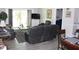Inviting living room with stylish furniture, and natural light flowing through the large windows at 1212 Rosewood St, Largo, FL 33770