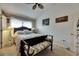 Bedroom with a bench, carpet floors, and natural light at 13905 Abbey Ln, Largo, FL 33771