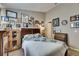 A charming bedroom featuring a baseball-themed decor and lots of natural lighting at 13905 Abbey Ln, Largo, FL 33771