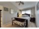 Bedroom with a bench, carpet floors, and natural light at 13905 Abbey Ln, Largo, FL 33771