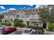 Charming two-story townhome with well-maintained landscaping and available parking spaces at 13905 Abbey Ln, Largo, FL 33771
