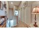 Upstairs hallway features carpet floors and multiple storage closets at 13905 Abbey Ln, Largo, FL 33771