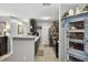 Bright kitchen featuring stainless appliances, modern cabinets, and a breakfast bar overlooking living space at 1400 Gandy N Blvd # 809, St Petersburg, FL 33702
