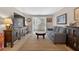 Bright living room featuring a modern entertainment center and cozy seating arrangement at 1400 Gandy N Blvd # 809, St Petersburg, FL 33702