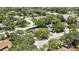 House in a green neighborhood, an aerial shot capturing the home's integration into the community at 14619 Daybreak Dr, Lutz, FL 33559