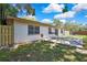 Backyard featuring patio and a new wooden fence at 14619 Daybreak Dr, Lutz, FL 33559