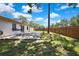 Backyard featuring patio and a new wooden fence at 14619 Daybreak Dr, Lutz, FL 33559