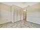 Bedroom includes a closet with louvered doors and tile flooring at 14619 Daybreak Dr, Lutz, FL 33559