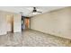 Bedroom with tile flooring, ceiling fan, closet, and neutral wall paint at 14619 Daybreak Dr, Lutz, FL 33559