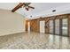 Bright living room with tile floors, offering ample space and showcasing a blend of textures and materials at 14619 Daybreak Dr, Lutz, FL 33559