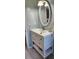 Bright bathroom featuring modern sink on white vanity and stylish lighting at 1583 Eunice Ln, Clearwater, FL 33756