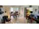 Open-concept living and dining areas with stylish marble floors and modern decor at 1583 Eunice Ln, Clearwater, FL 33756
