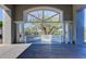 Balcony features beautiful view, classic columns, and white balustrade at 1827 Foxboro Ct, Oldsmar, FL 34677