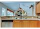Kitchen with modern stainless steel appliances and lots of natural light at 1827 Foxboro Ct, Oldsmar, FL 34677