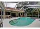 Enjoy this screened-in pool with a spa, perfect for relaxing and entertaining outdoors at 1827 Foxboro Ct, Oldsmar, FL 34677