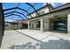 Enjoy the expansive screened patio with a lake view, perfect for relaxing or entertaining at 19209 Long Lake Ranch Blvd, Lutz, FL 33558