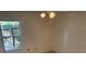 Cozy bedroom with view to backyard through a large window, ceiling fan at 1922 Blue Sage Ct, Brandon, FL 33511