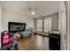 Bedroom with large windows, modern crib, and dedicated exercise area at 1976 Marlington Way, Clearwater, FL 33763