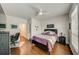 Well-lit bedroom with a dedicated workspace and ample closet space at 1976 Marlington Way, Clearwater, FL 33763