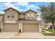 Exterior shot of garage featuring neutral paint scheme and landscaping at 1976 Marlington Way, Clearwater, FL 33763