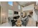 Expansive living area featuring soaring ceilings, natural light, and an open layout to the kitchen at 1976 Marlington Way, Clearwater, FL 33763