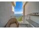 Balcony with seating, metal shelving, and a beautiful view of the water at 2 Seaside Ln # 801, Belleair, FL 33756