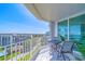 Relaxing balcony area with outdoor seating and panoramic city views at 2 Seaside Ln # 801, Belleair, FL 33756