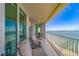 Relaxing balcony area with chairs and stunning ocean views at 2 Seaside Ln # 801, Belleair, FL 33756