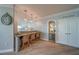 Charming dining area with a bar, wine cooler, and convenient access to the living space at 2 Seaside Ln # 801, Belleair, FL 33756