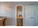 Dining area with wine cooler offering space for bar, dining area is convenient to the living space at 2 Seaside Ln # 801, Belleair, FL 33756