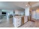 Modern kitchen features stainless steel appliances, white cabinetry, and a marble countertop island at 2 Seaside Ln # 801, Belleair, FL 33756