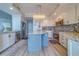 Bright modern kitchen featuring stainless appliances, custom cabinets, and marble countertops at 2 Seaside Ln # 801, Belleair, FL 33756