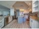 Modern kitchen with center island, stainless appliances, and custom cabinets at 2 Seaside Ln # 801, Belleair, FL 33756