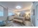 Cozy main bedroom with neutral tones, decorative lighting, and ample natural light at 2 Seaside Ln # 801, Belleair, FL 33756