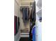 Organized walk-in closet with custom shelving and hanging space for clothes and accessories at 2575 W Platt St, Tampa, FL 33609