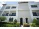 Charming two-story townhome featuring well-maintained landscaping and a private entrance at 2575 W Platt St, Tampa, FL 33609