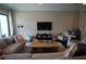 Spacious living room with comfortable seating, decorative pillows and natural light at 2575 W Platt St, Tampa, FL 33609