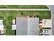 Overhead view of a well-maintained home with lush landscaping, driveway, and a tidy roof at 2937 Stilwell Ct, New Port Richey, FL 34655