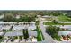 Spacious neighborhood featuring neatly arranged homes with manicured lawns and community spaces at 2937 Stilwell Ct, New Port Richey, FL 34655